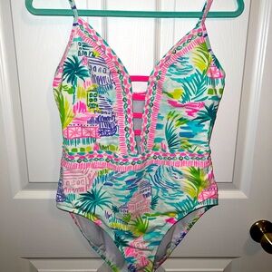 Super cute 1 piece with adjustable straps. Worn 2x. Hand washed & hung to dry.